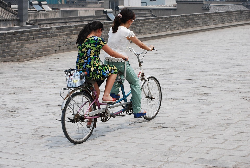 Tandem, Riding