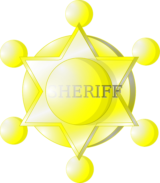Free sheriff badge yellow vector
