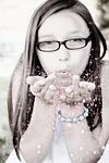 girl blowing glitter, face, portrait