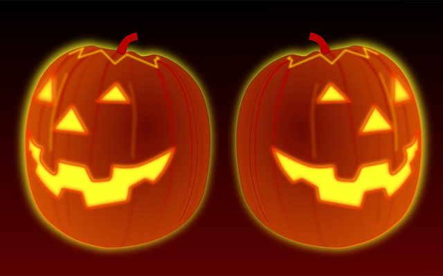 Free halloween pumpkins glowing vector