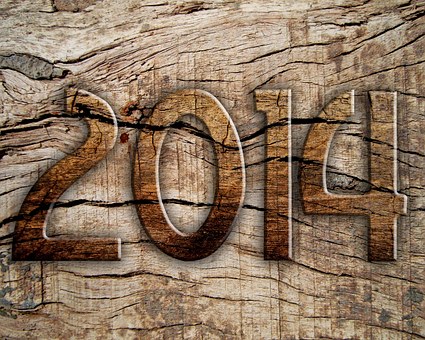 The year 2014 etched in wood for top 100companies for remote jobs in 2014