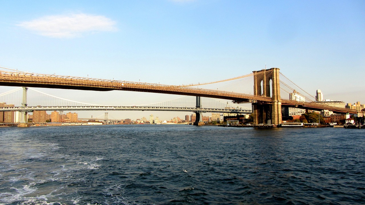 an overview of the suspension bridge between the east river from brooklyn to manhattan island Brooklyn bridge and new york city photos the brooklyn bridge looms majestically over new york city’s east river brooklyn bridge - facts & summary. an overview of the suspension bridge between the east river from brooklyn to manhattan island Brooklyn bridge and new york city photos the brooklyn bridge looms majestically over new york city’s east river brooklyn bridge - facts & summary.