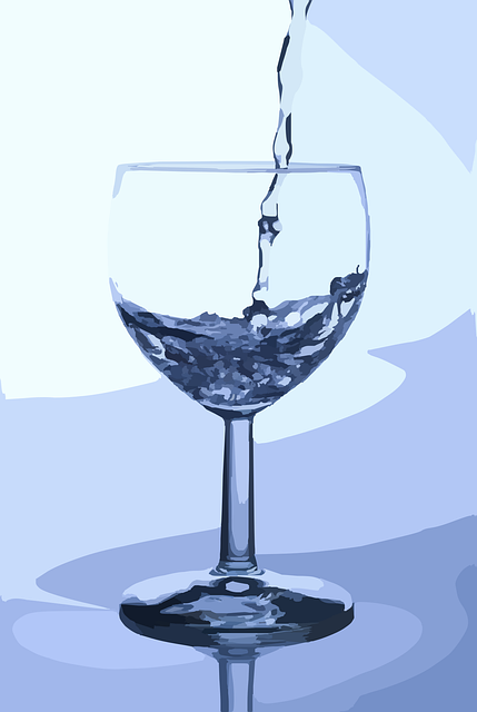 Free water glass pouring vector