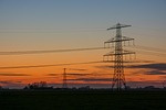 electric poles, stream, nightfall