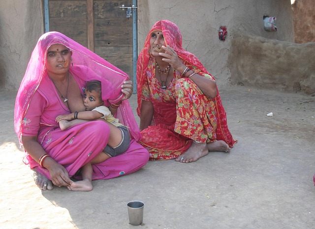 Free Women Feeding With Milk photo and picture