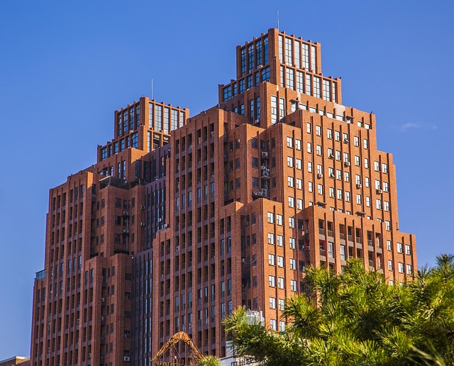 Free Tall Building Clear Blue Sky photo and picture