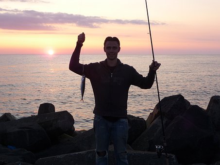 Free Angler Fishing Rod photo and picture