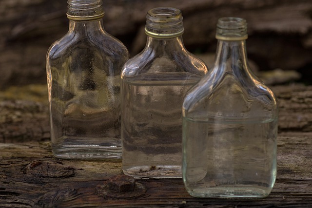 still life, wooden board, bottles, lighting mood, in the free