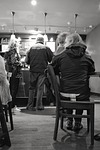 coffee shop, woman waiting for friend, people queuing