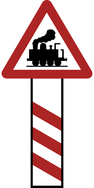 Free warning railway crossing road sign vector