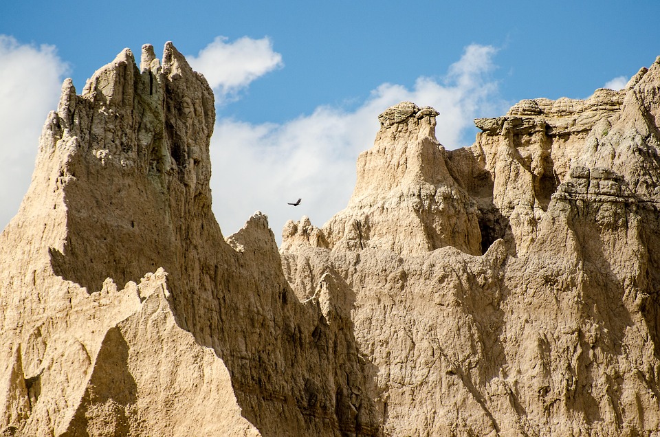 badlands rock formations blue