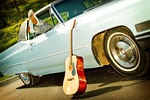 classic car, boots, acoustic guitar
