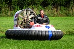 hovercraft, grass, man