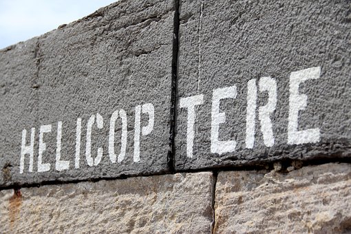 Hubschrauber, Mauer, Typografie