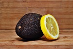an avocado, lemon, food