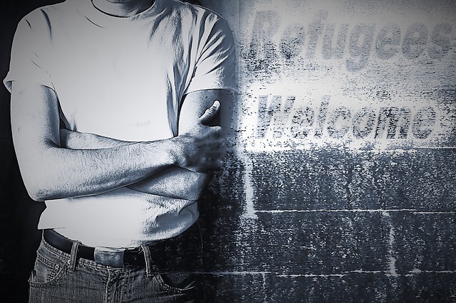 Free man wall refugees illustration