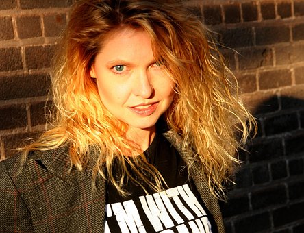 Free Woman Brickwall photo and picture