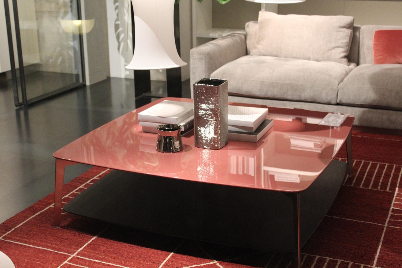 Small UK living room showing compact sofa with slim furniture and open floor space