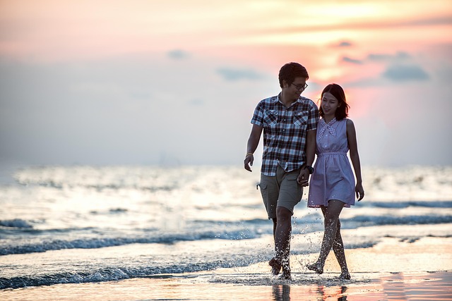 Happy valentines day, couple, holding hands and beach — photo by sasint