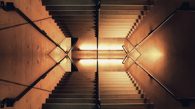 Stairs, handrails, illuminated and lighting — photo by Pexels