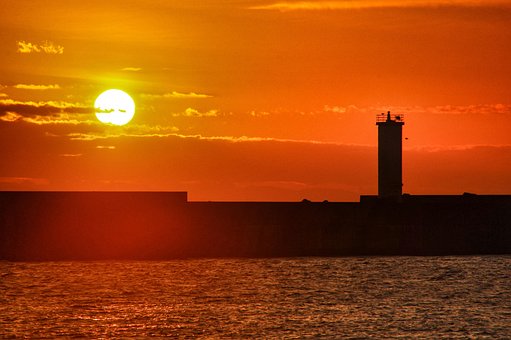 Free Sunrise Lighthouse photo and picture