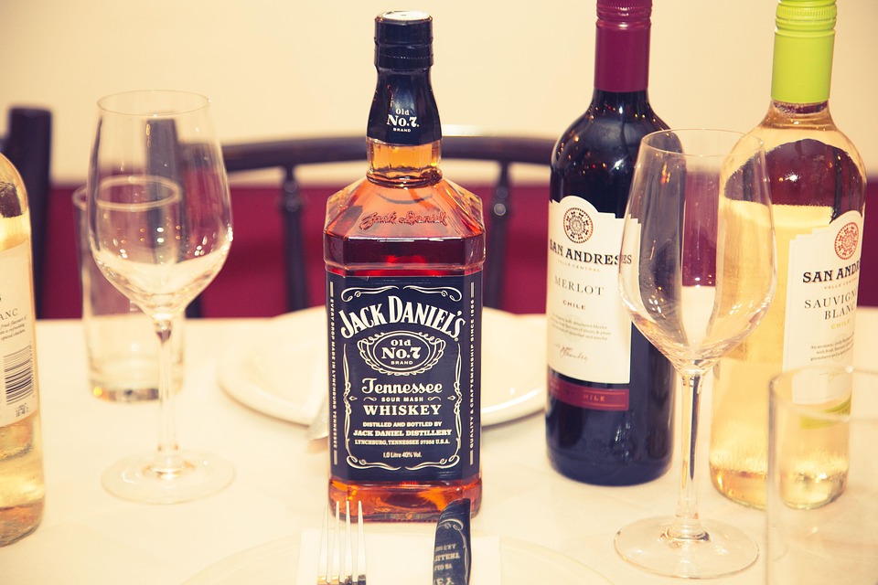Different bottles of bourbons