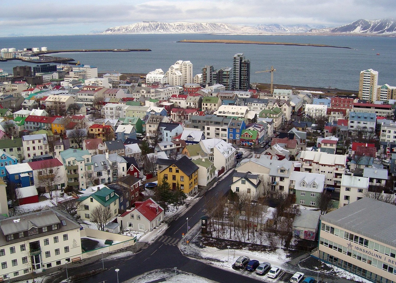 Reykjavik skyline with colorful houses and the Hallgrimskirkja church tower visible in the distance