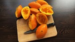 oranges, presses, knife