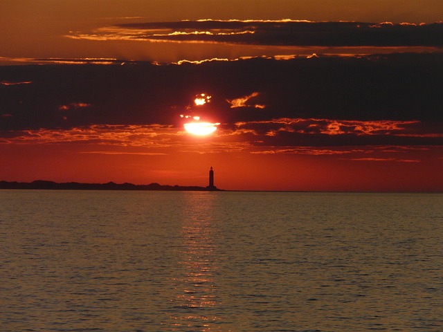 Free Sunset Lighthouse photo and picture