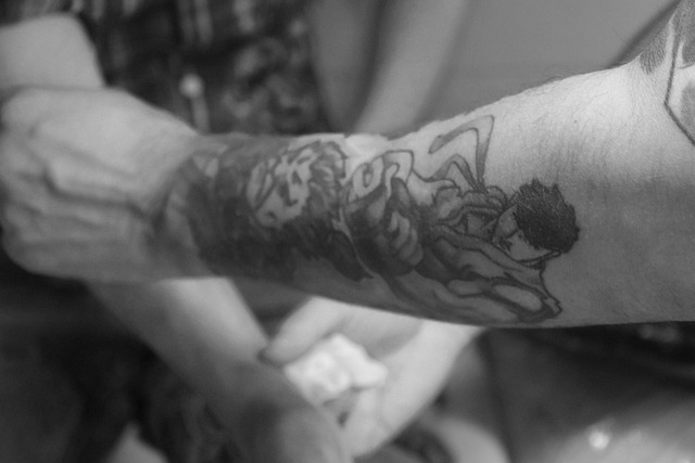 Free Tattoo Artist Tattooing photo and picture
