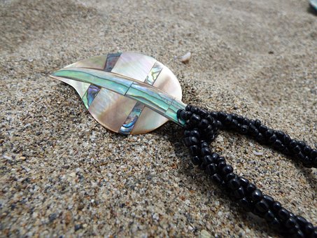 Free Pendants Of Mother-Of-Pearl Beach photo and picture