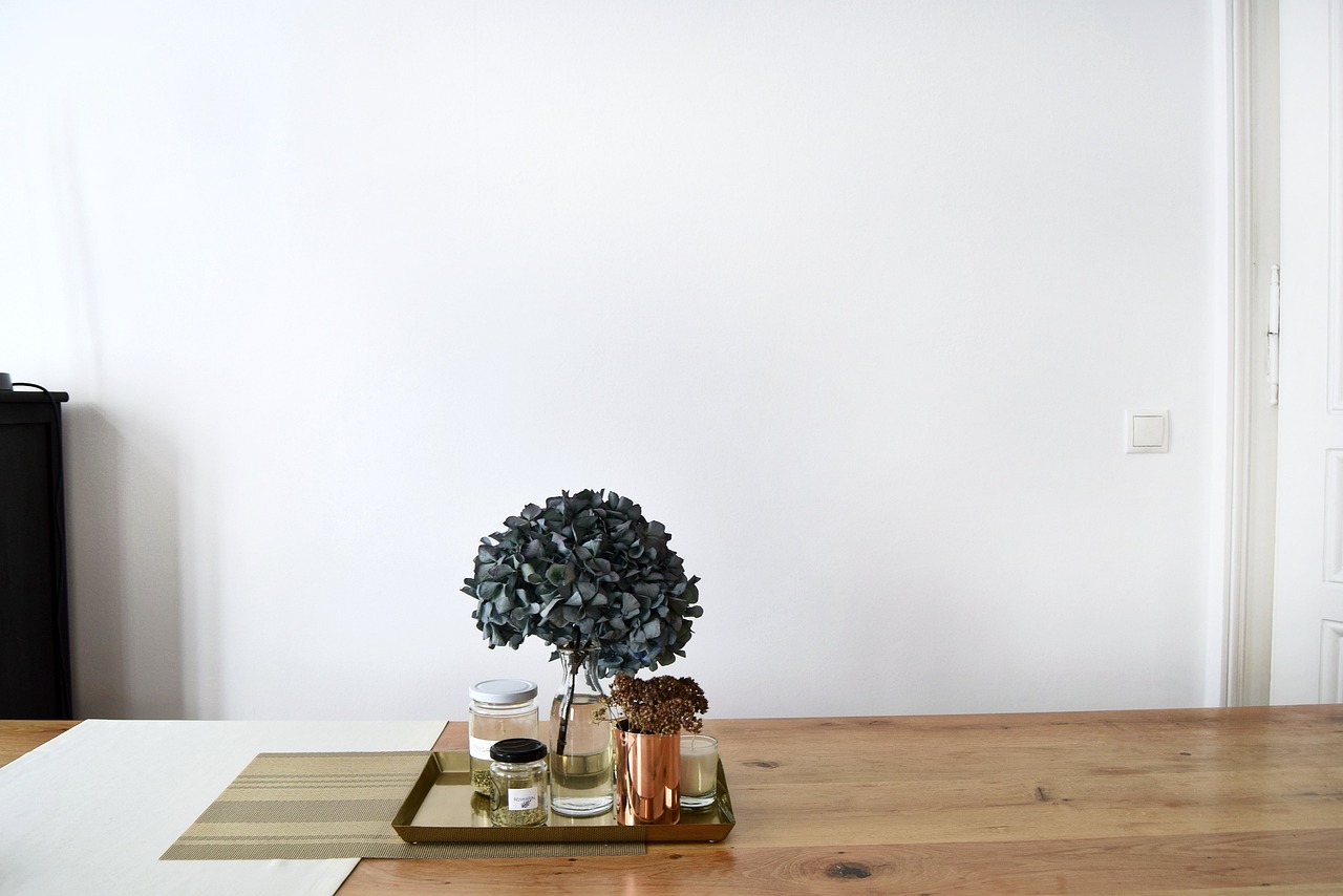 Modern coffee table tray decor with candles and accessories