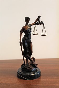 Justitia, Justicia, Ceguera
