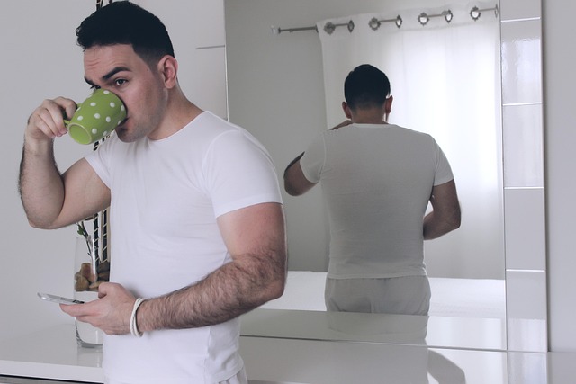 man, boy, white, using phone, using mobile device, people, young, male, person, adult, lifestyle, father, love, modern, men, handsome, home, smart phone, gray phone, gray mobile, gray smartphone, gray telephone