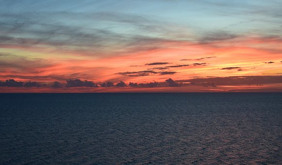 Free Sunset Over The Water Travel photo and picture