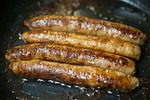 swiss francs, sausages, fry