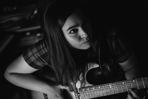 Free Woman Guitar photo and picture