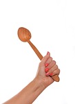 female hand, wooden spoon, to cook