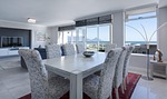 modern minimalist dining room, open plan, sea view