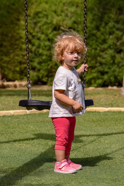 childhood, girl, infant, kid, child, baby, first steps, cute, playing, fun, outdoors, park, swing