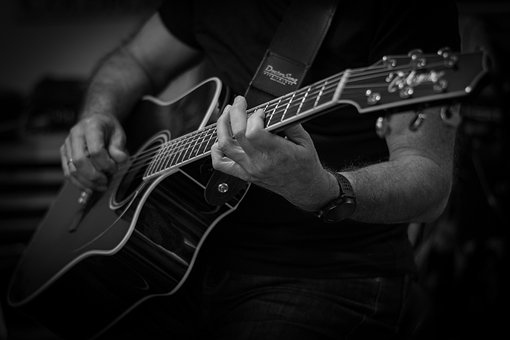 Chitară, Chitaristul, Guitar Player