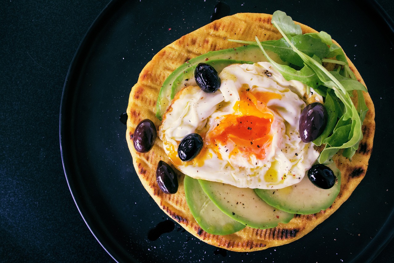 Scrambled eggs with avocado, a gluten free alternative to bread toast
