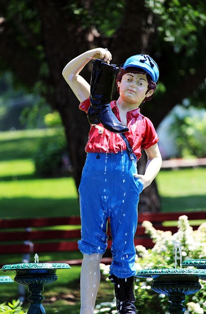 Free Boy And The Boot Fountain Water photo and picture