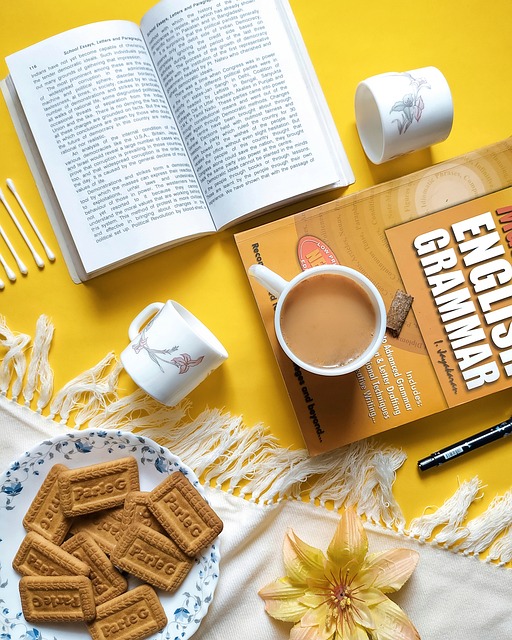 books, cups, cookies, treat, snack, tea, earbuds, books, tea, tea, tea, earbuds, earbuds, earbuds, earbuds, earbuds