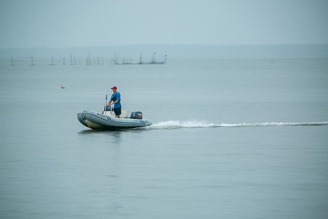Free Zodiac Boat Man photo and picture