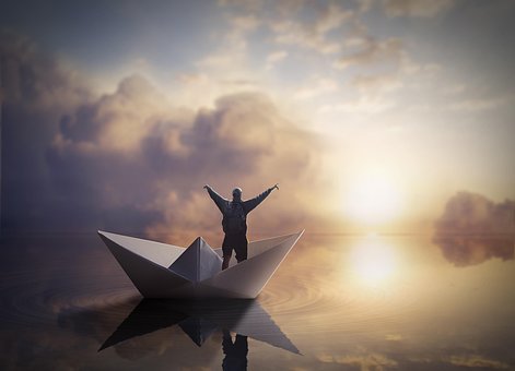 Free Paper Boat Man photo and picture