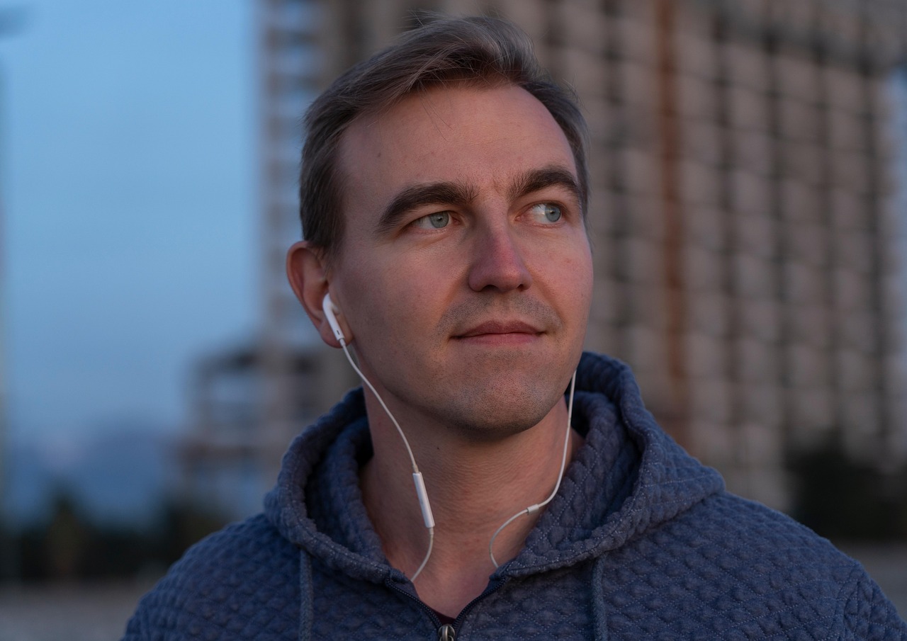 Download free HD stock image of Man Earphones Free Man Earphones photo and picture