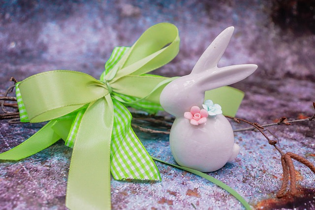 easter bunny, spring decoration, ceramic rabbit, easter, holiday decor, easter ornament, easter decoration, green ribbon, festive bunny, cute animal, table decoration, spring holiday, seasonal decor, floral bunny, easter background, celebration, spring vibes, adorable bunny, cottagecore, rustic charm, spring table, holiday theme, decorative bunny, bunny, spring