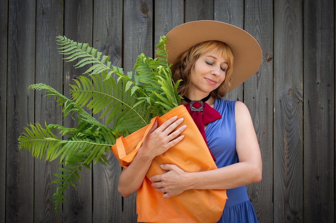 woman, a bag, plants, hat, florist, smile, fern, hedge, summer, human, nature, young, portrait, russian, slav
