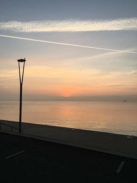 Free Sunrise Next To The Street Lamp photo and picture